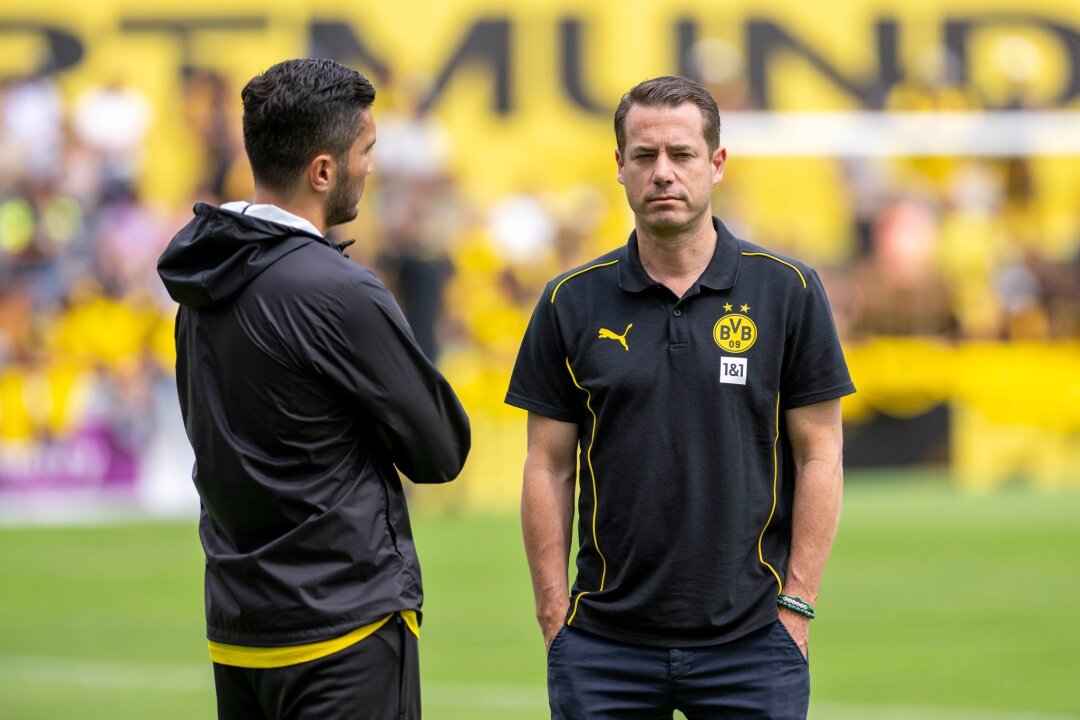 BVB-Boss Ricken: Keine Diskussion über Trainer Sahin - BVB-Boss Lars Ricken diskutiert nicht über Trainer Nuri Sahin (links)