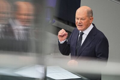 Erstes Wahlkampfduell: Merz attackiert - Scholz verteidigt - Die Regierungserklärung von Kanzler-Scholz ist der Schlusspunkt unter die kurze Ampel-Ära und der Auftakt für den Wahlkampf.