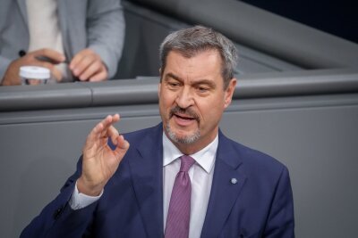 Erstes Wahlkampfduell: Merz attackiert - Scholz verteidigt - CSU-Chef Markus Söder spricht erstmals im Bundestag.