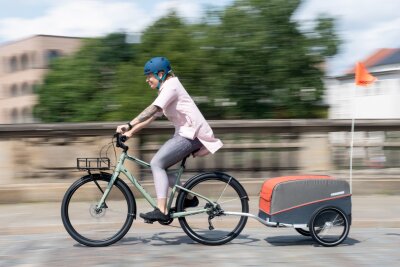 Fahrradtaschen für jede Tour: 8 Modelle im Überblick - Wie ein Kofferraum: Das Gepäck kann man auch im Fahrradanhänger transportieren.