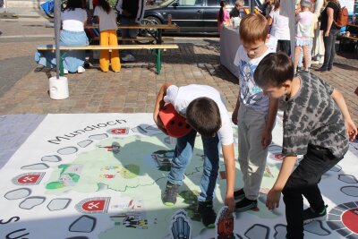 Freiberg feiert den Weltkindertag auf dem Obermarkt - Beim Weltkindertag gab es auch ein Outdoor-Brettspiel des Landschaf(f)t e.v.