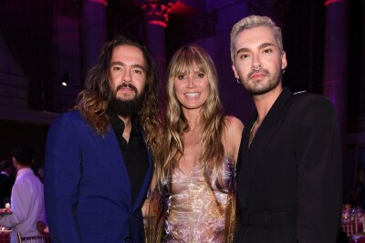 Kaulitz-Brüder werden 35: So sahen Bill und Tom früher aus - In den vergangenen Jahren hat Tom Kaulitz (hier mit Ehefrau Heidi Klum) seinen Stil kaum noch verändert - im Gegensatz zu seinem Bruder Bill ...