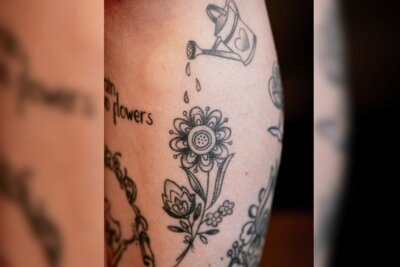 Maja (32) aus Chemnitz: Von Tinkerbell bis Matrjoschka - Dieses Tattoo symbolisiert ihren Optimismus - No rain, no flowers...