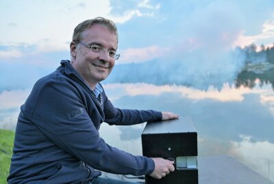 Mischung aus Tanz, Musik, Show und Akrobotik: So lief das Filzteichfest in Schneeberg - Enrico Oswald und sein Team haben das Multimediaspektakel mit Feuerwerk und Lasershow auf den Filzteich gezaubert. Foto: Ralf Wendland