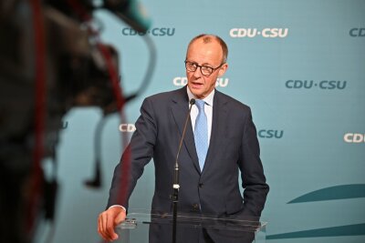 Neuwahl nach Ampel-Aus am 23. Februar - CDU-Chef Friedrich Merz zeigt sich am Ende zufrieden mit dem Wahltermin