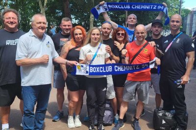 Die Wölfe Delegation bei Maxi (Mitte) und René (rechts) bei den olympischen Spielen in Paris.