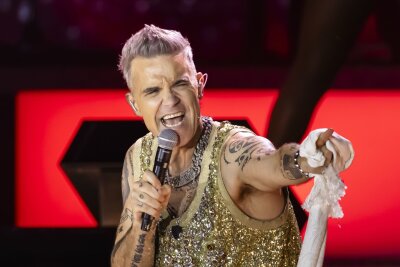 Robbie Williams in Deutschland - Ticket-Verkauf startet - Sieben Auftritte in Deutschland: Für die Konzerte von Superstar Robbie Williams beginnt der Vorverkauf. (Archivbild)