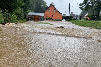 Überschwemmung wegen Unwetter im Erzgebirge - Überschwemmung wegen Unwetter im Erzgebirge. Foto: Daniel Unger