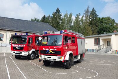 Zuckertüten und Aktionen: Feuerwehren unterstützen beim Schulanfang in Mittelsachsen - Mit bunten Girlanden, Buchstaben und Zuckertüten dekoriert, trugen die Einsatzfahrzeuge zur fröhlichen Atmosphäre des Festes bei. 